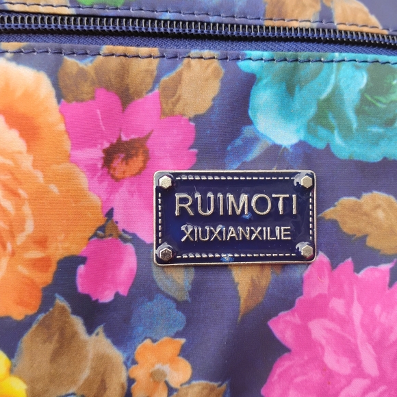 RUIMOTI Floral Crossbody Bag in Navy with Pink & Blue Flowers - Picture 3 of 6